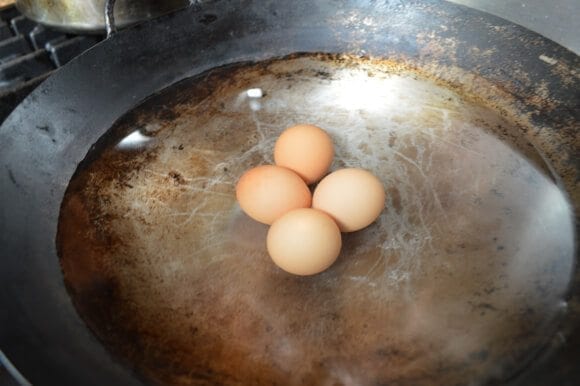 Red Cooked Pork (Hong Shao Rou) - boiled eggs by thewoksoflife.com