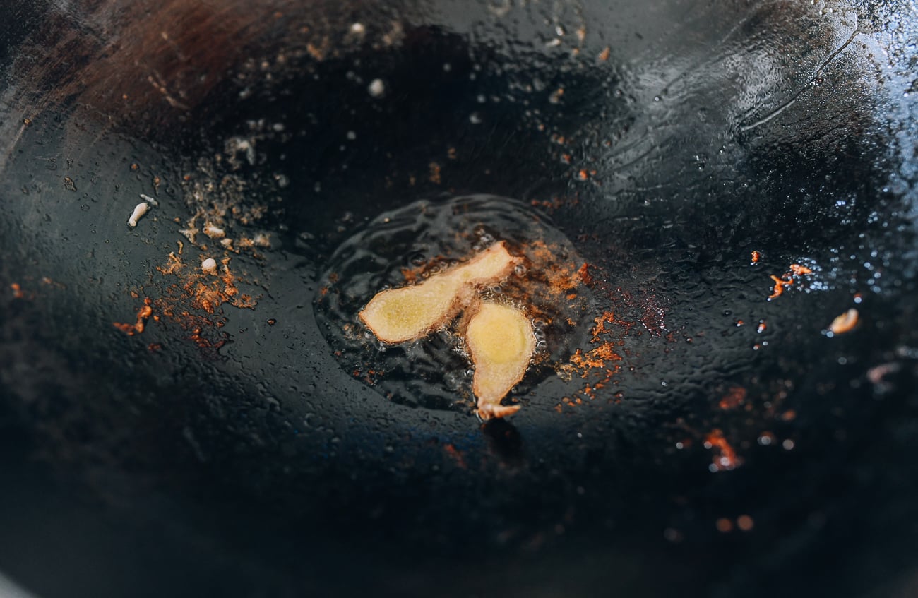Ginger slices in wok
