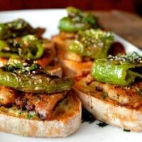 Pinchos with pork belly and peppers