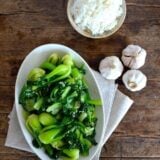 Stir-fried bok choy with bowl of rice