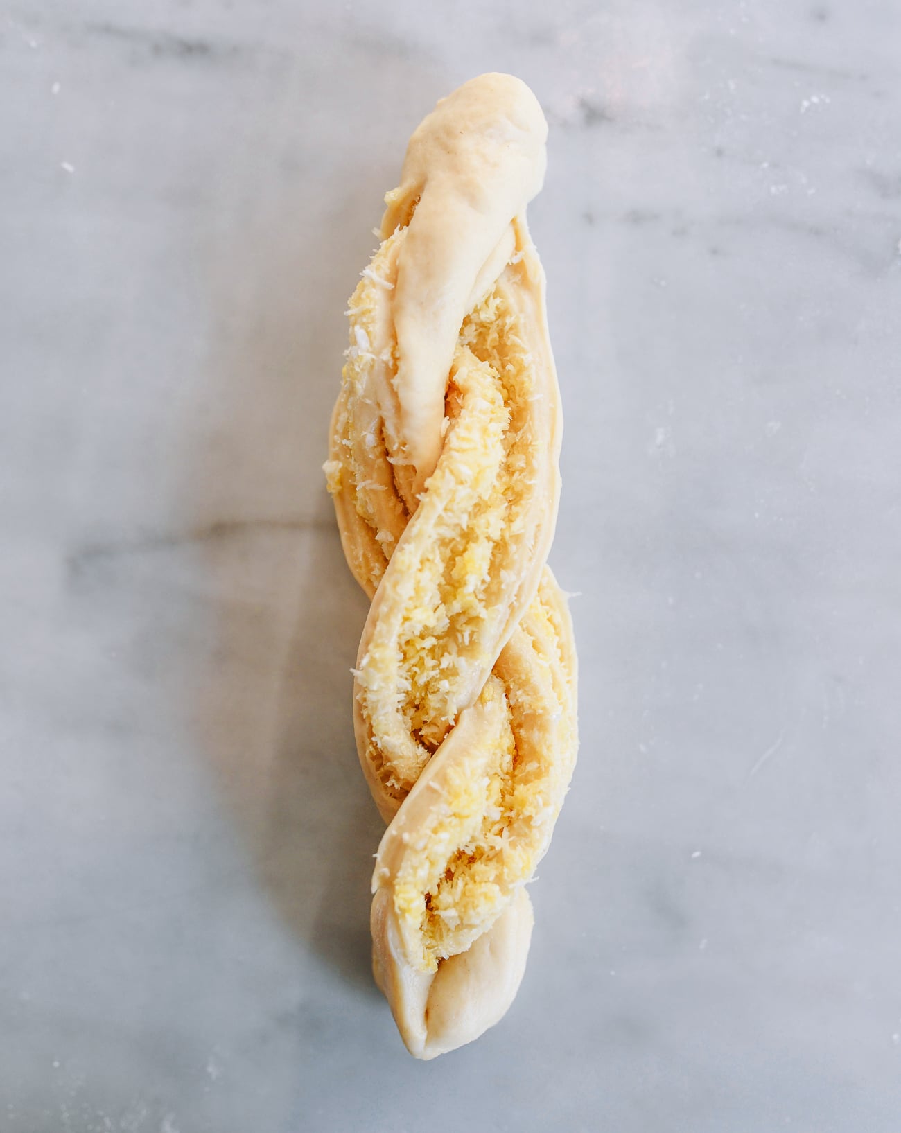 Twisted filled coconut dough