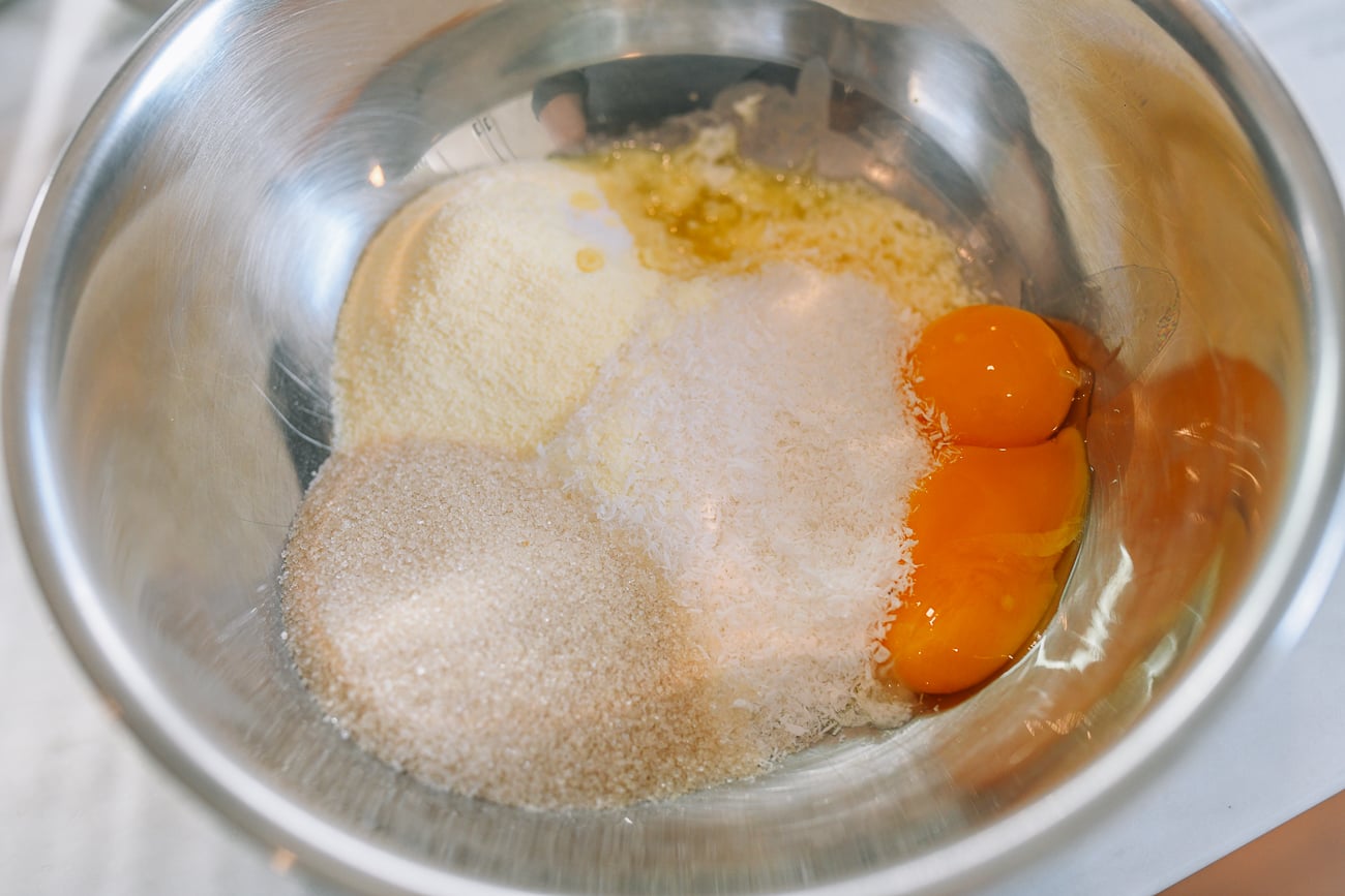 Coconut filling ingredients in metal mixing bowl