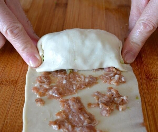 rolling chinese stuffed pancakes
