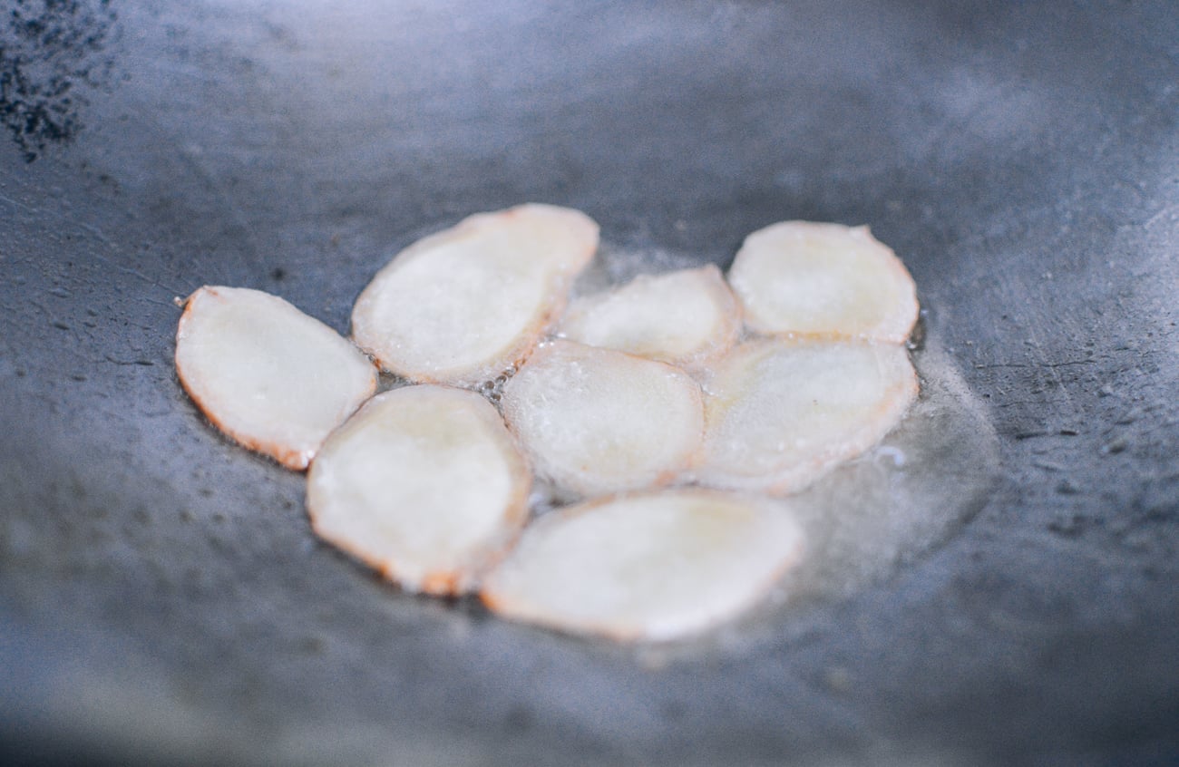 ginger slices in wok