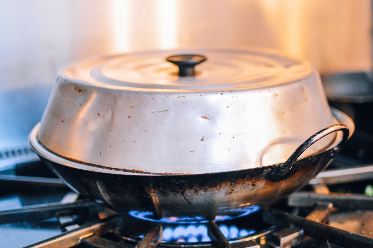 wok with cover on it