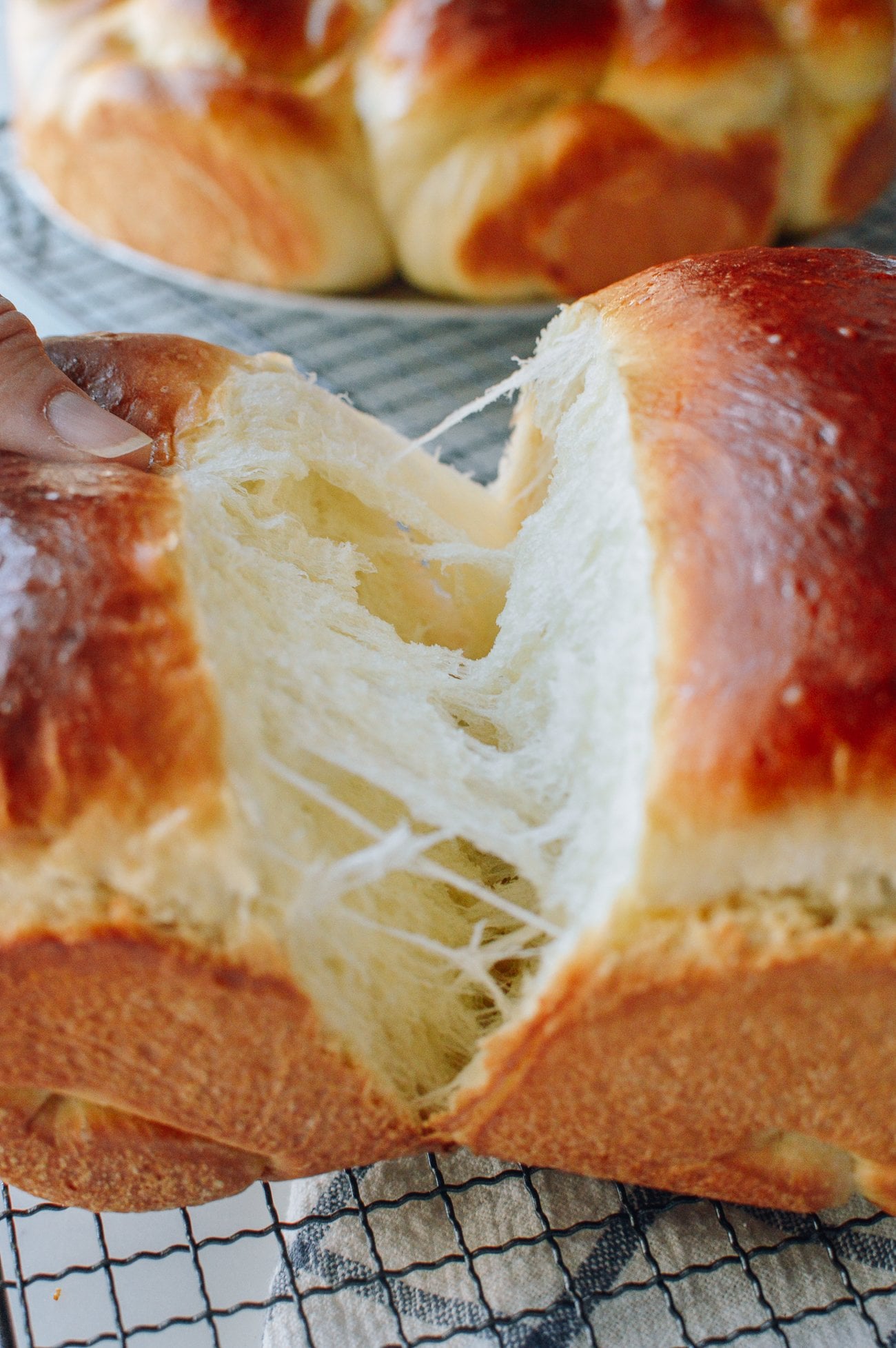Tearing apart milk bread loaves