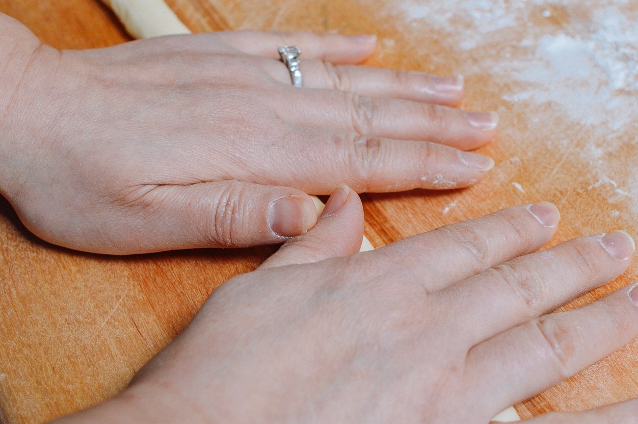 rolling dough into a rope