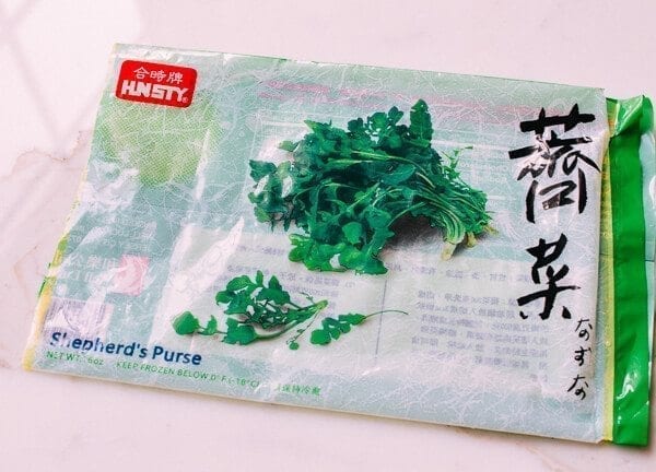 Shanghai Rice Cake Stir-fry w/ Greens, by thewoksoflife.com