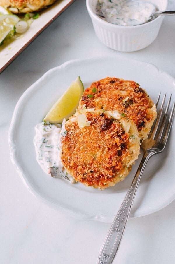 Sesame Panko Crab Cakes with Cilantro Lime Tartar Sauce, by thewoksoflife.com