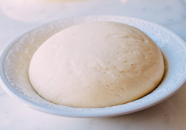 Steamed BBQ Pork Buns (Char Siu Bao), by thewoksoflife.com