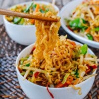 picking up ramen noodles with chopsticks