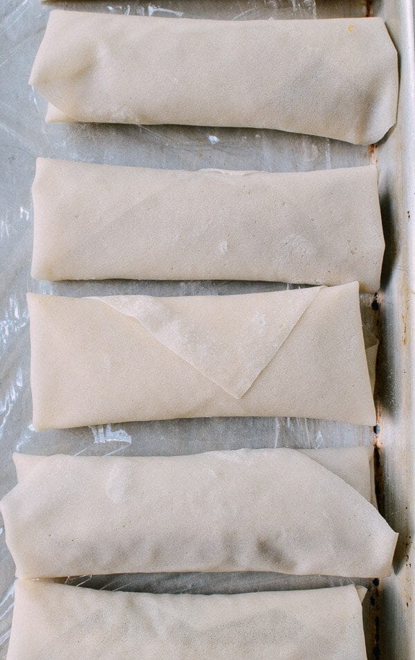 Assembled spring rolls on tray, thewoksoflife.com