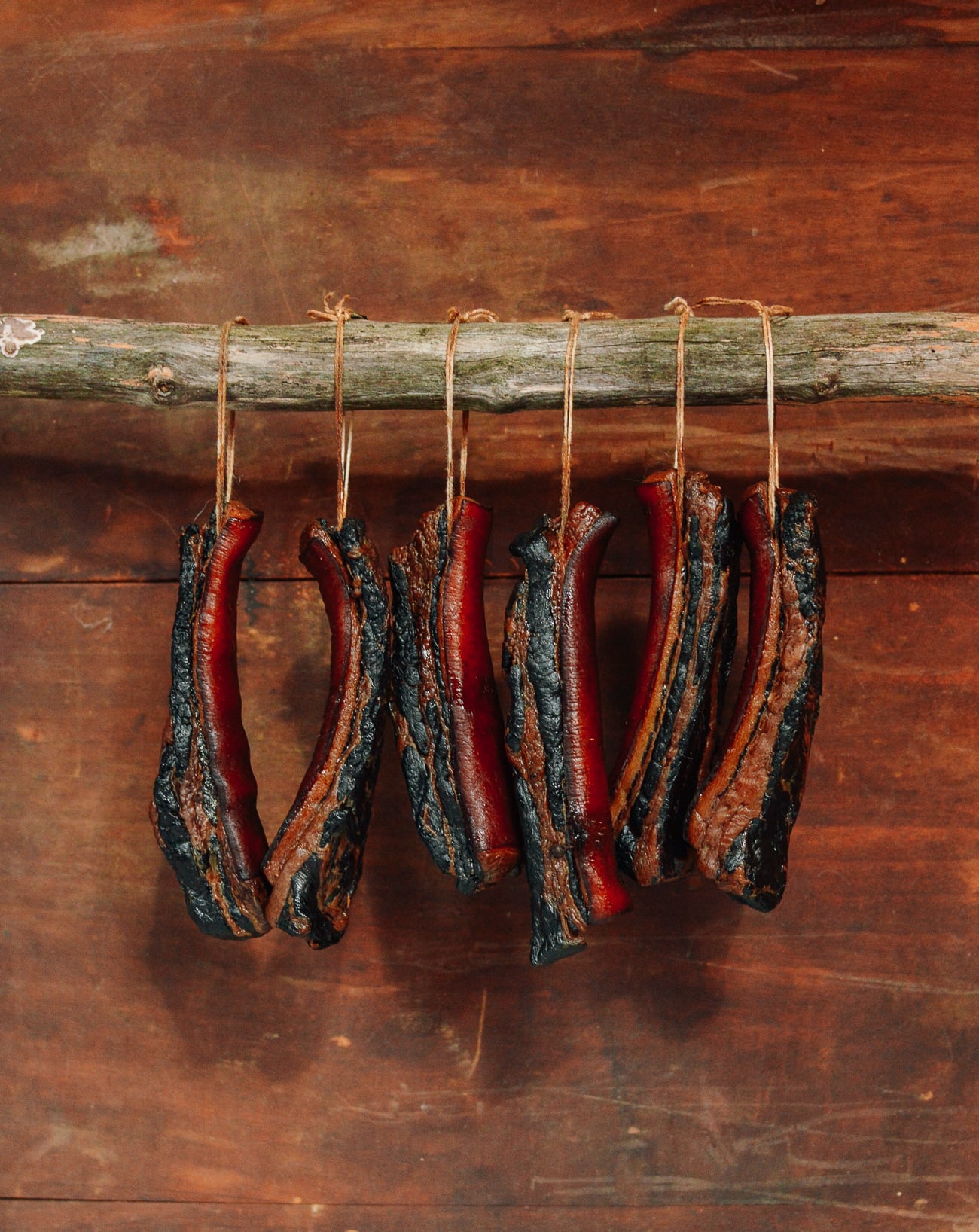 Chinese cured pork belly hanging while drying