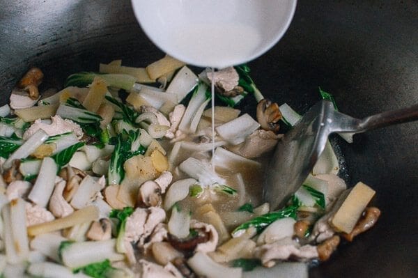 Adding cornstarch to thicken stir-fry sauce, thewoksoflife.com