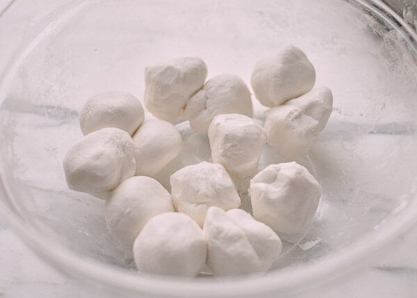 Tang Yuan (Sweet Rice Balls with Black Sesame Filling), by thewoksoflife.com