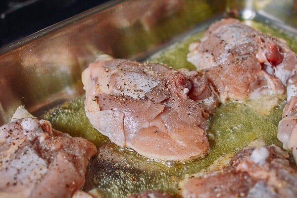 Roasted Lemon Chicken Thighs with Potatoes, by thewoksoflife.com