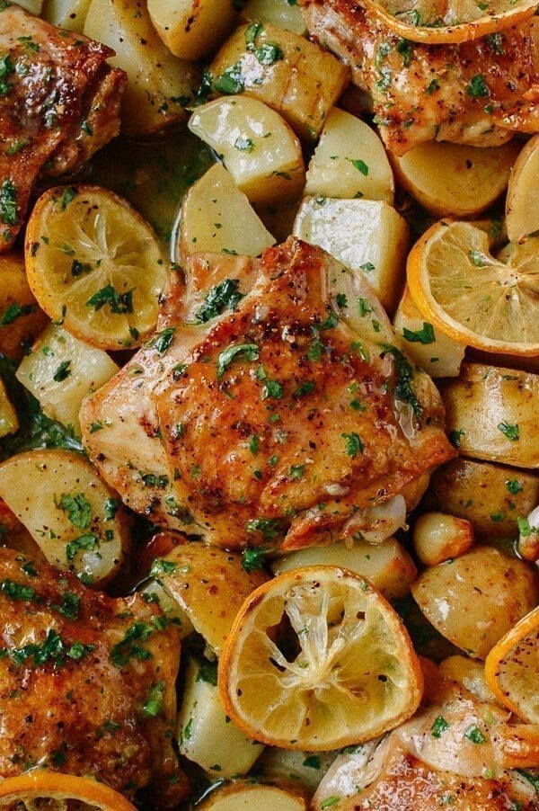 Roasted Lemon Chicken Thighs with Potatoes, by thewoksoflife.com