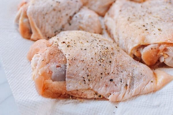 Roasted Lemon Chicken Thighs with Potatoes, by thewoksoflife.com