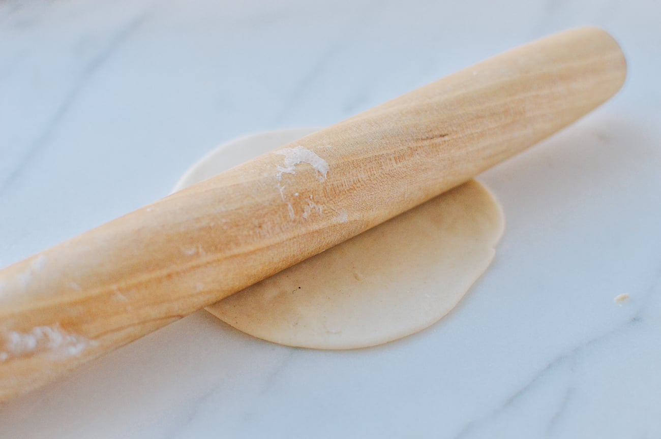 rolling out dumpling wrapper