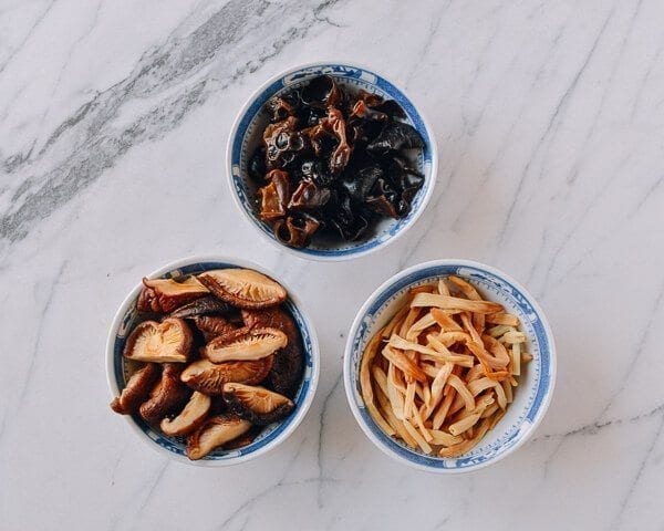 Reconstituted dried shiitakes, wood ears, and Lily Flowers, by thewoksoflife.com