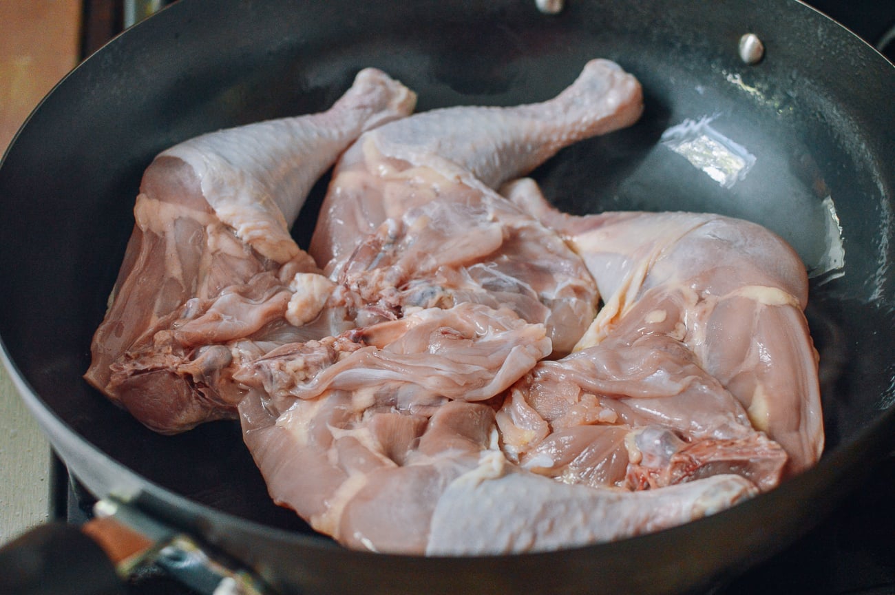 searing chicken leg quarters in wok