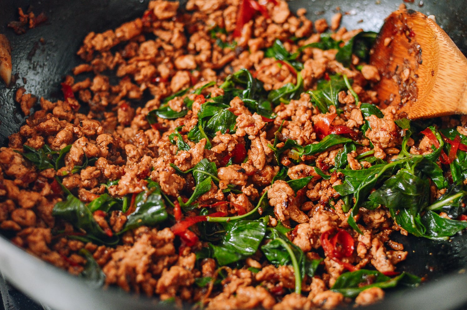thai basil chicken in wok