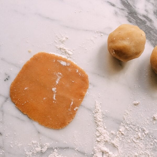 Lotus Mooncakes with Salted Egg Yolks, by thewoksoflife.com