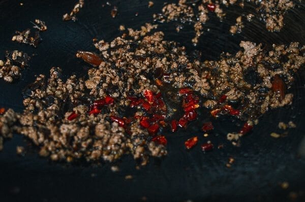 Stir-Fried Green Beans with Pork and Chinese Olive Vegetable, by thewoksoflife.com