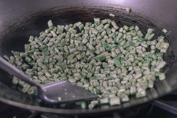 Stir-Fried Green Beans with Pork and Chinese Olive Vegetable, by thewoksoflife.com