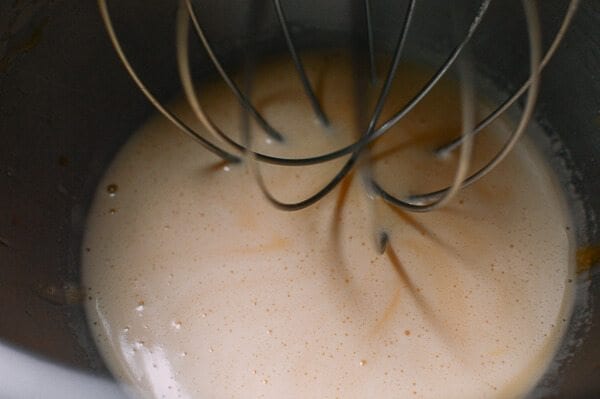 eggs and mile mixed for Cantonese Steamed Custard Buns (Nai Wong Bao), by thewoksoflife.com