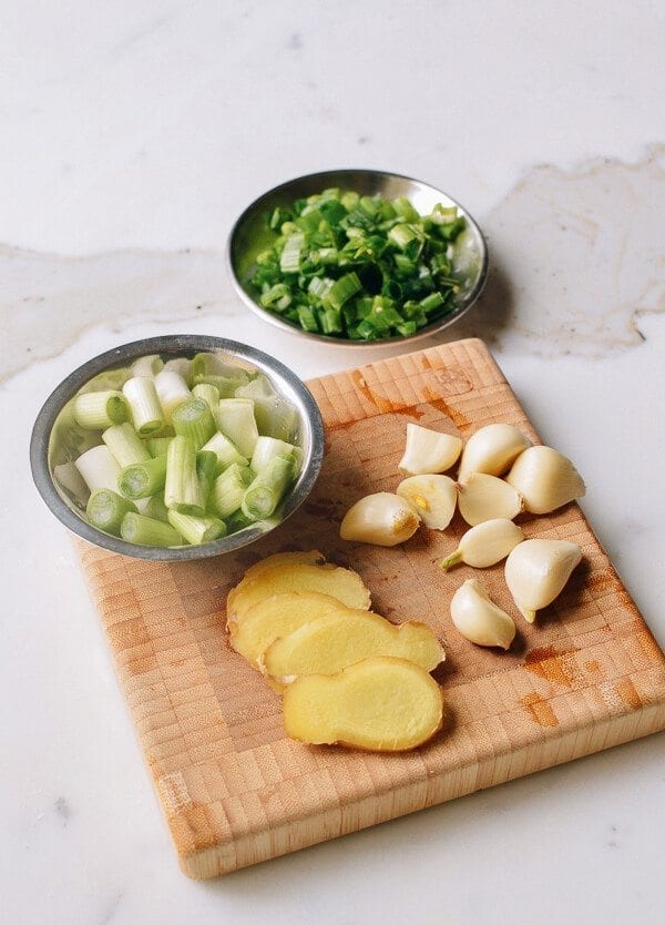 3 scallions, white and green parts separated