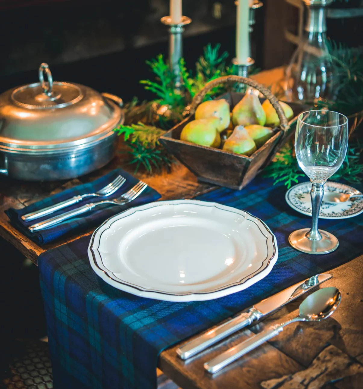French Gien Filets white plate with black piping on a set table 