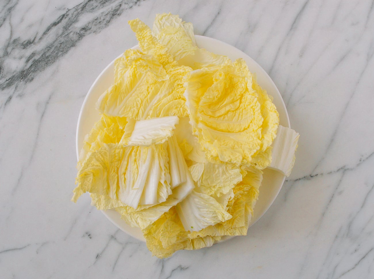 Napa cabbage leaves on plate