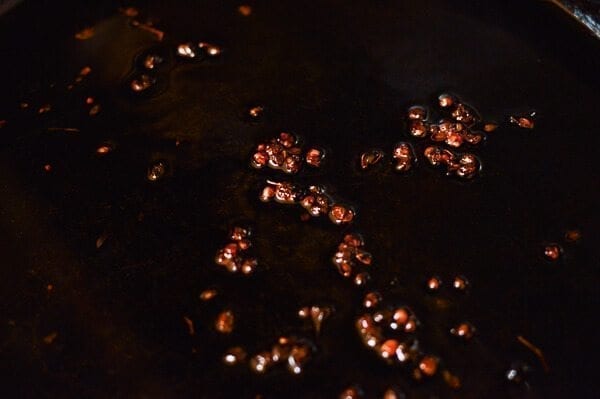 Sichuan peppercorns infusing oil, thewoksoflife.com