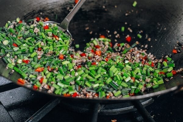 Garlic Chives with Pork, by thewoksoflife.com