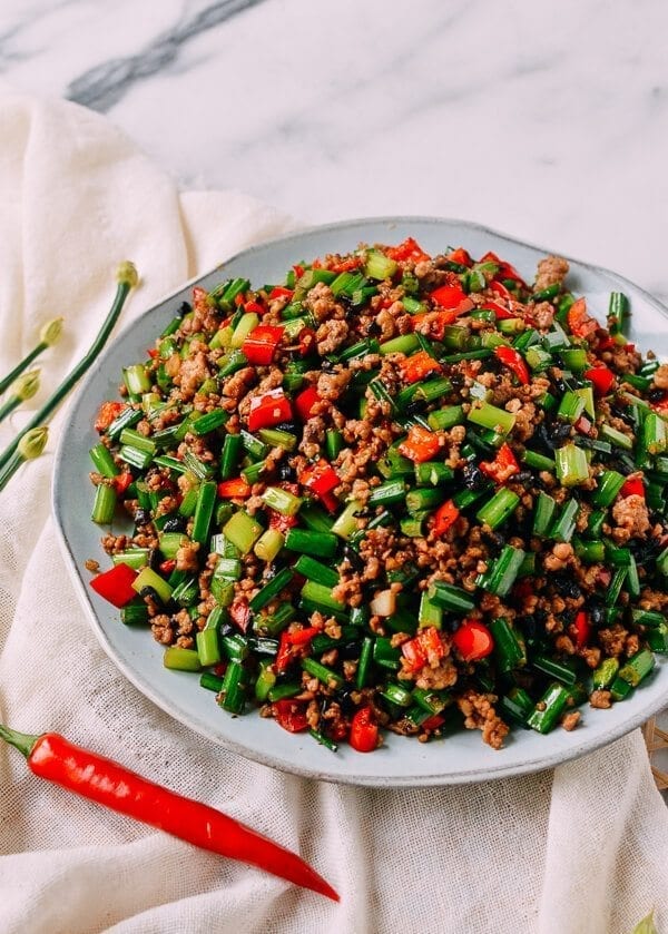 Garlic Chives with Pork, by thewoksoflife.com