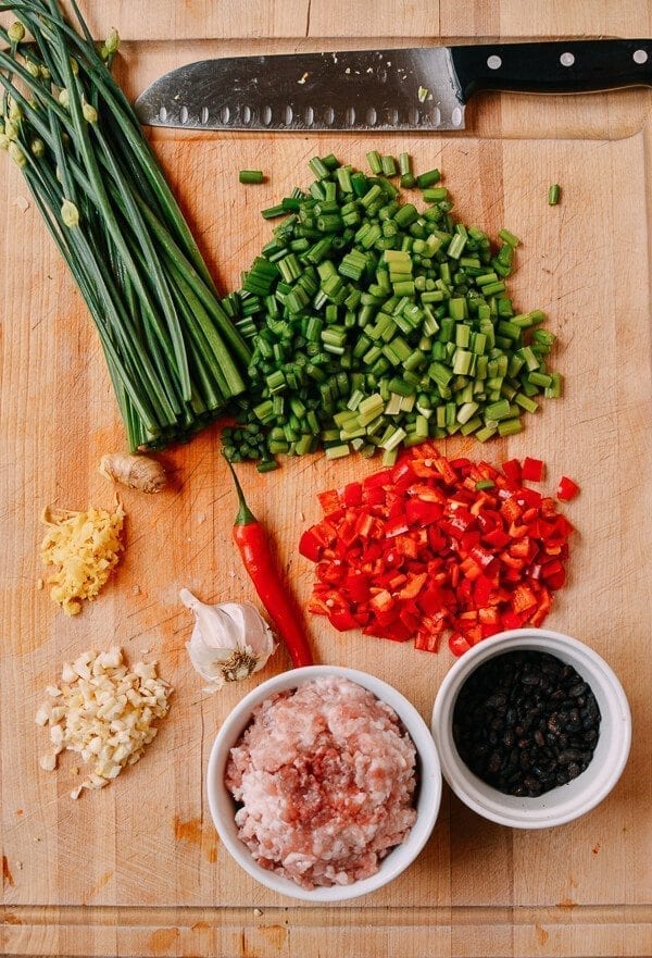 Garlic Chives with Pork, by thewoksoflife.com