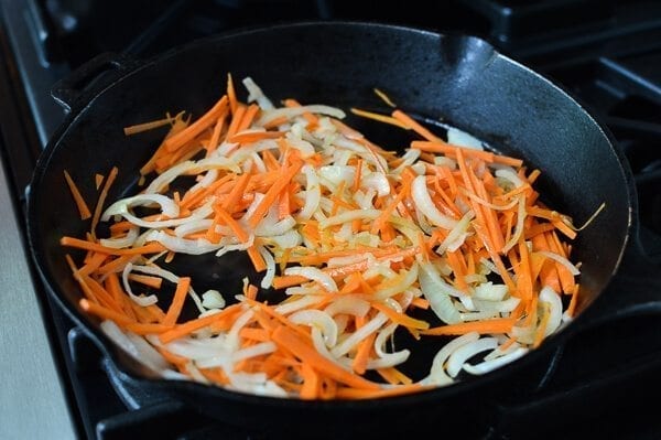Stir-frying carrot and onion, by thewoksoflife.com