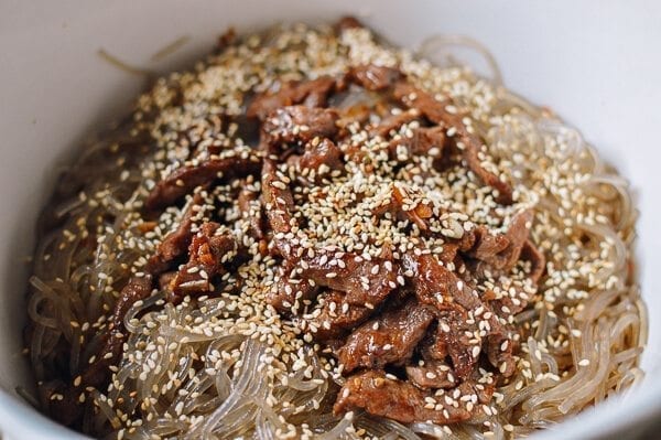 Mixing together japchae, thewoksoflife.com