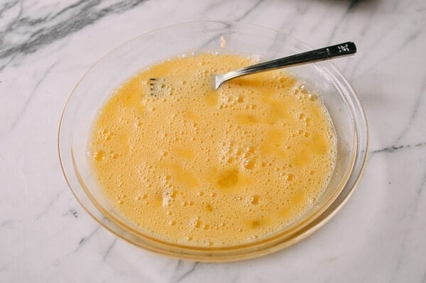 Beaten egg for dredging, by thewoksoflife.com