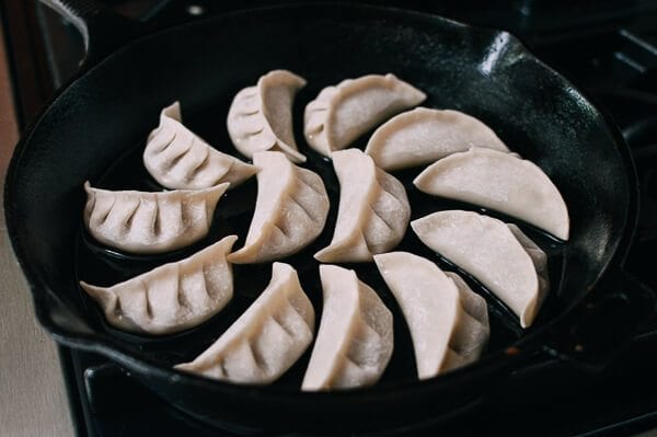 Dumplings in cast iron skillet, thewoksoflife.com
