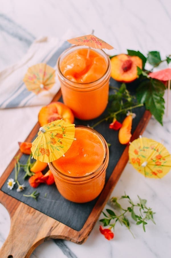 Frozen Peach Daiquiris, by thewoksoflife.com