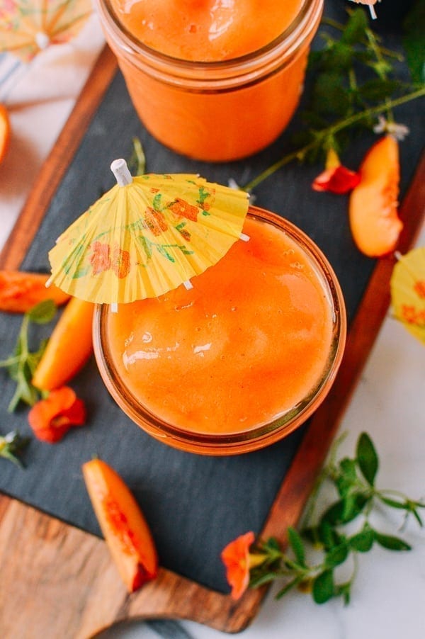 Frozen Peach Daiquiris, by thewoksoflife.com