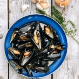 Steamed mussels are a delicious appetizer or main course and so quick and easy to make at home when armed with a few tips. Our favorites are PEI mussels, but as long as they’re fresh, you can’t go wrong.
