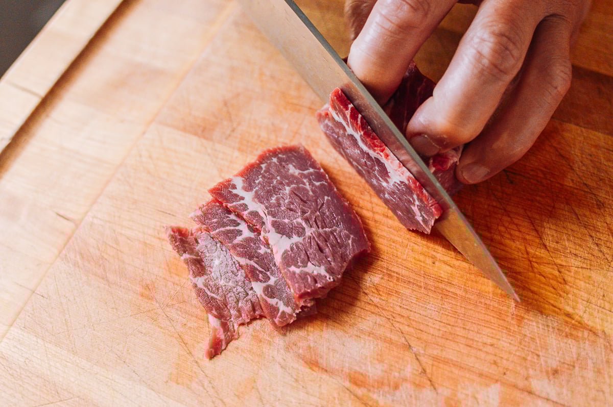 Thinly slicing beef chuck