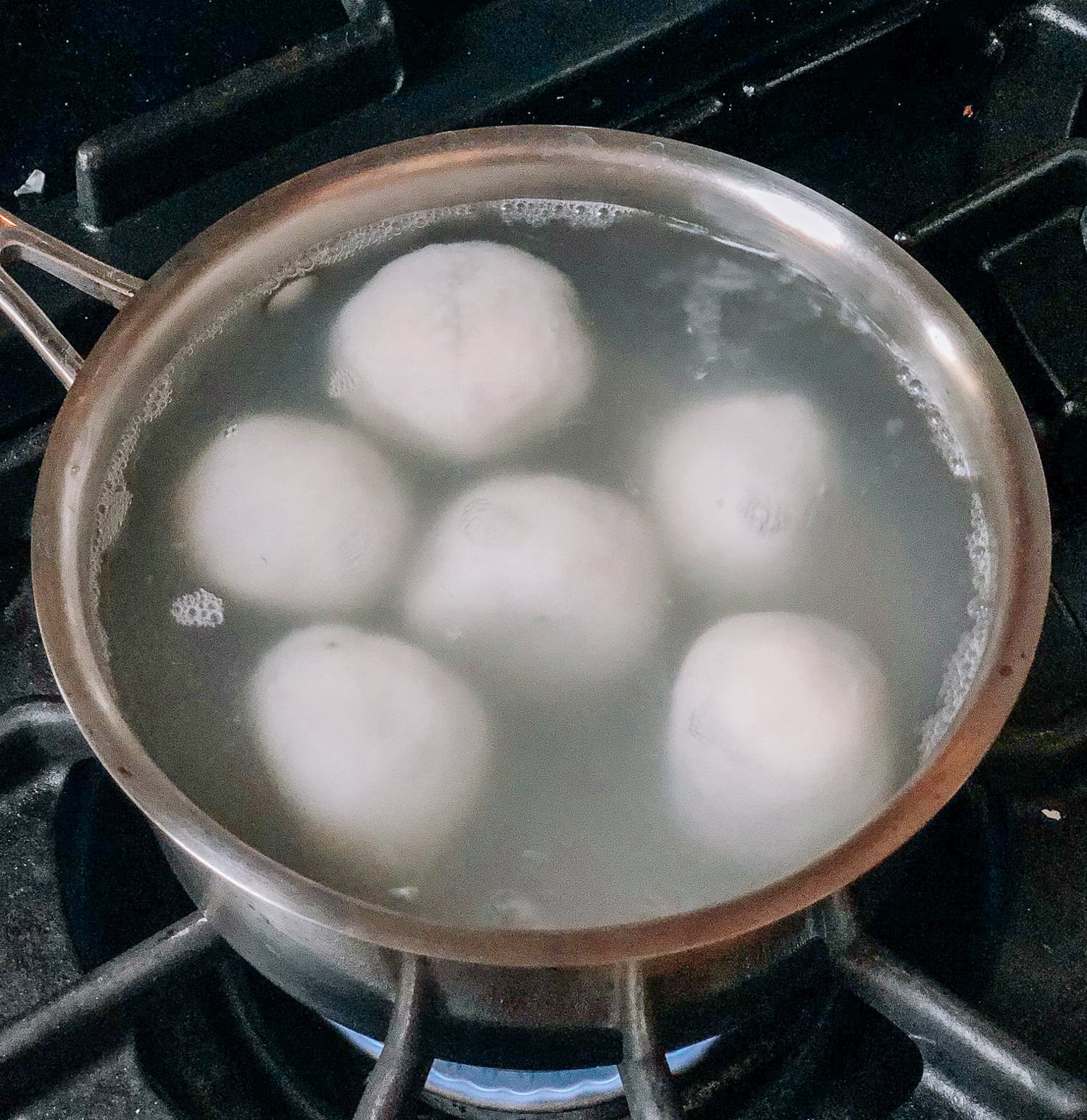 cooking Savory Tang Yuan in water, by thewoksoflife.com