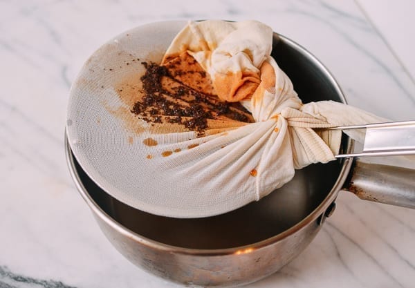 Hong Kong Milk Tea filtering tea through pantyhose, by thewoksoflife.com