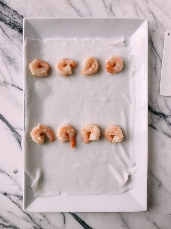 Shrimp Rice Noodle Rolls (Ha Cheung) wrapping the rolls, by thewoksoflife.com