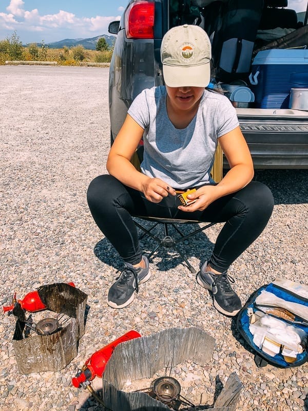 cooking on the ground with backpacking stoves, thewosoflife.com