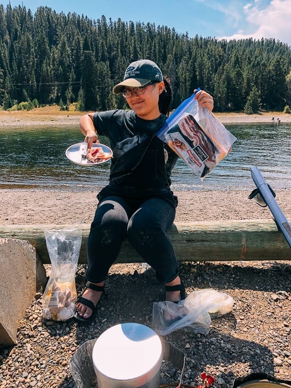 Kaitlin holding up bacon, thewoksoflife.com